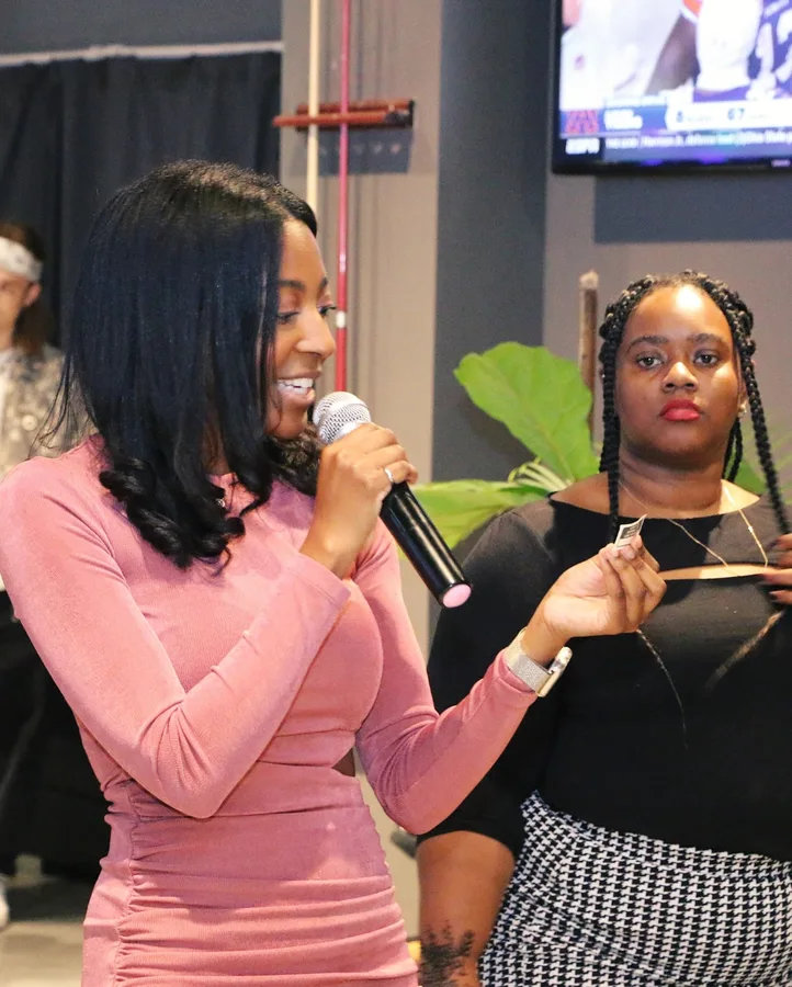 A guest speaker with the microphone